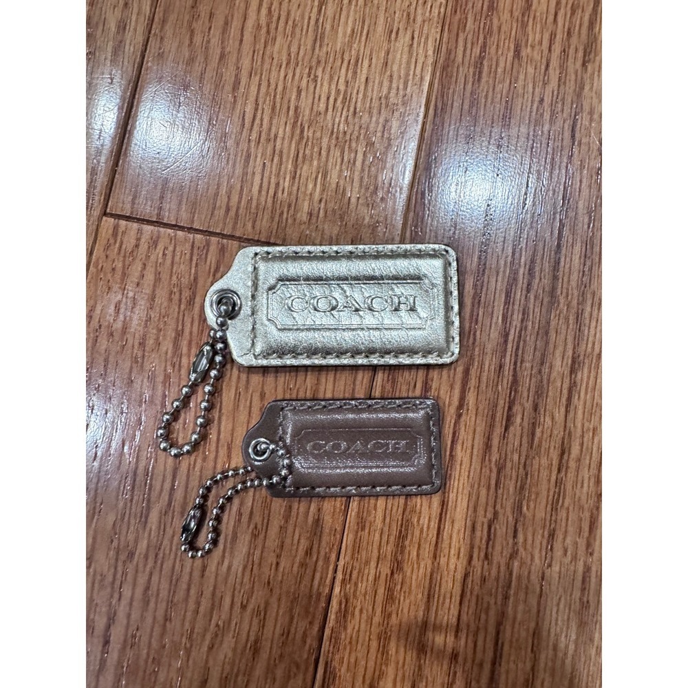 Lot of 2 Coach Leather Bag Charms Keychains Set Gold Brown Authentic‎